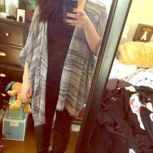 Grey flows cardigan.